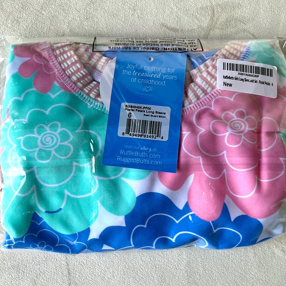 Rufflebutts girls long sleeved suit set in pastel petals